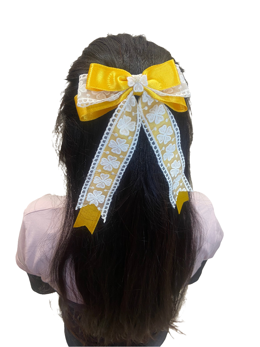 Yellow and white hair bow clip